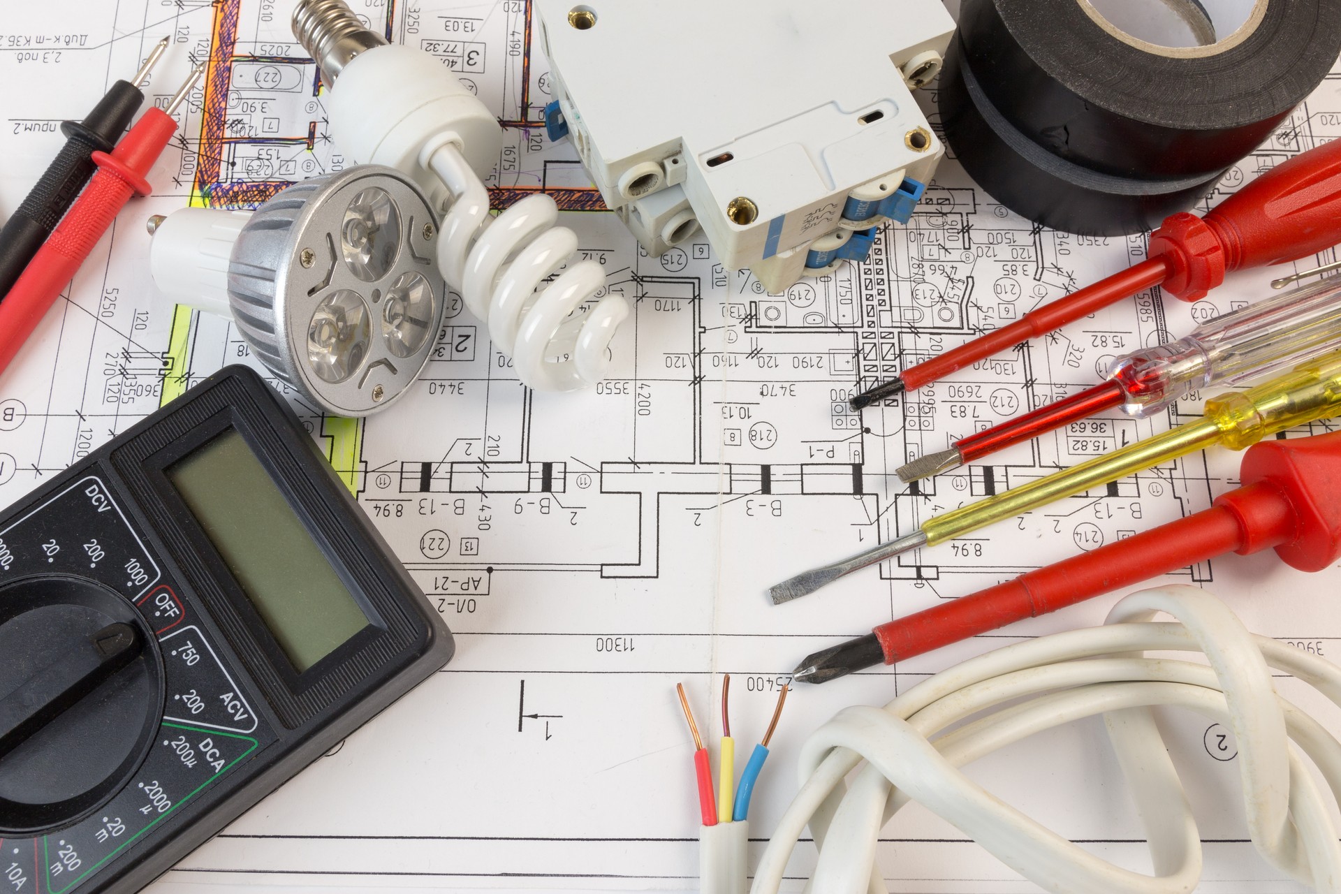 Still Life Of Electrical Components Arranged On Plans